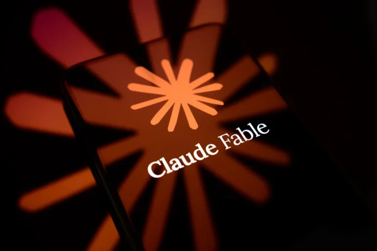 Smartphone screen displaying "Claude Fable" with an abstract, orange, radial design in the background.