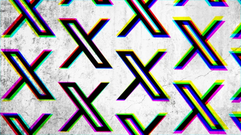 Multiple colorful letter Xs on a textured, cracked concrete background.
