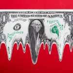 Distorted one-dollar bill melting against a red background.