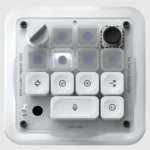 Compact keypad with various buttons and dials, featuring text "Work Louder | OpenAI 2026" and "You can just build things".