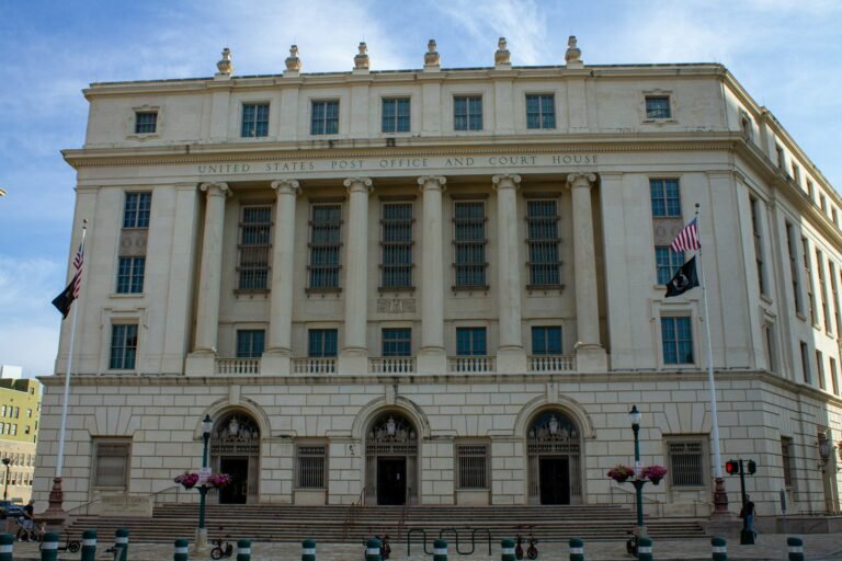 AI standards office leadership change highlighted by a government building exterior