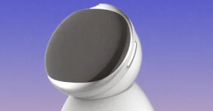 Sleek, futuristic wearable device with a smooth, rounded design against a gradient blue-purple background.