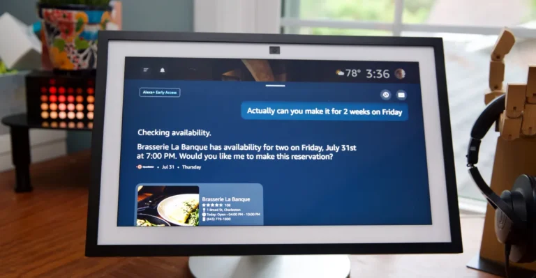 Smart display showing Alexa interface with a restaurant reservation query, temperature 78°F, time 3:36, headphones nearby.