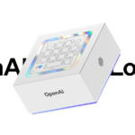 White box with holographic design containing a keypad, labeled OpenAI, with text "OpenAI Louder" in the background