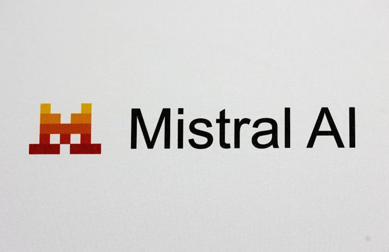 Mistral AI logo with a pixelated gradient design on the left and the text "Mistral AI" in black on a white background.