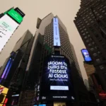 Skyscraper billboards display ads, including "$400M to build the fastest AI cloud" by General Compute, in a cityscape.