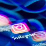 Instagram logo with vibrant colors and motion blur, set against a blue background with Meta's infinity symbol.