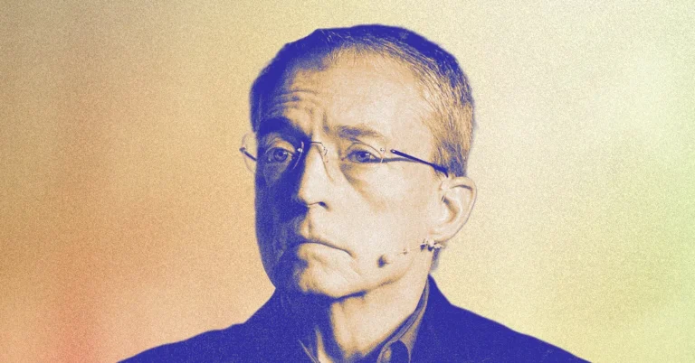 Man wearing glasses with a headset microphone, looking serious, against a gradient background.