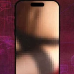 Pixelated smartphone screen on a dark red digital background with abstract patterns
