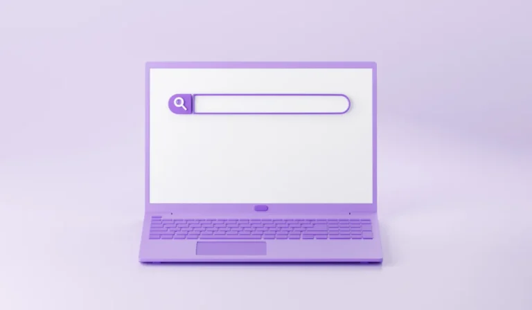 Purple laptop with a large search bar on the screen, set against a light purple background.