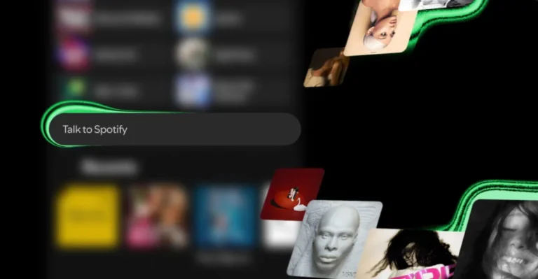 Blurred music app interface with floating album covers and a search bar displaying "Talk to Spotify".