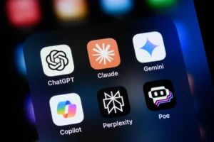 Smartphone screen displaying six AI app icons: ChatGPT, Claude, Gemini, Copilot, Perplexity, and Poe.