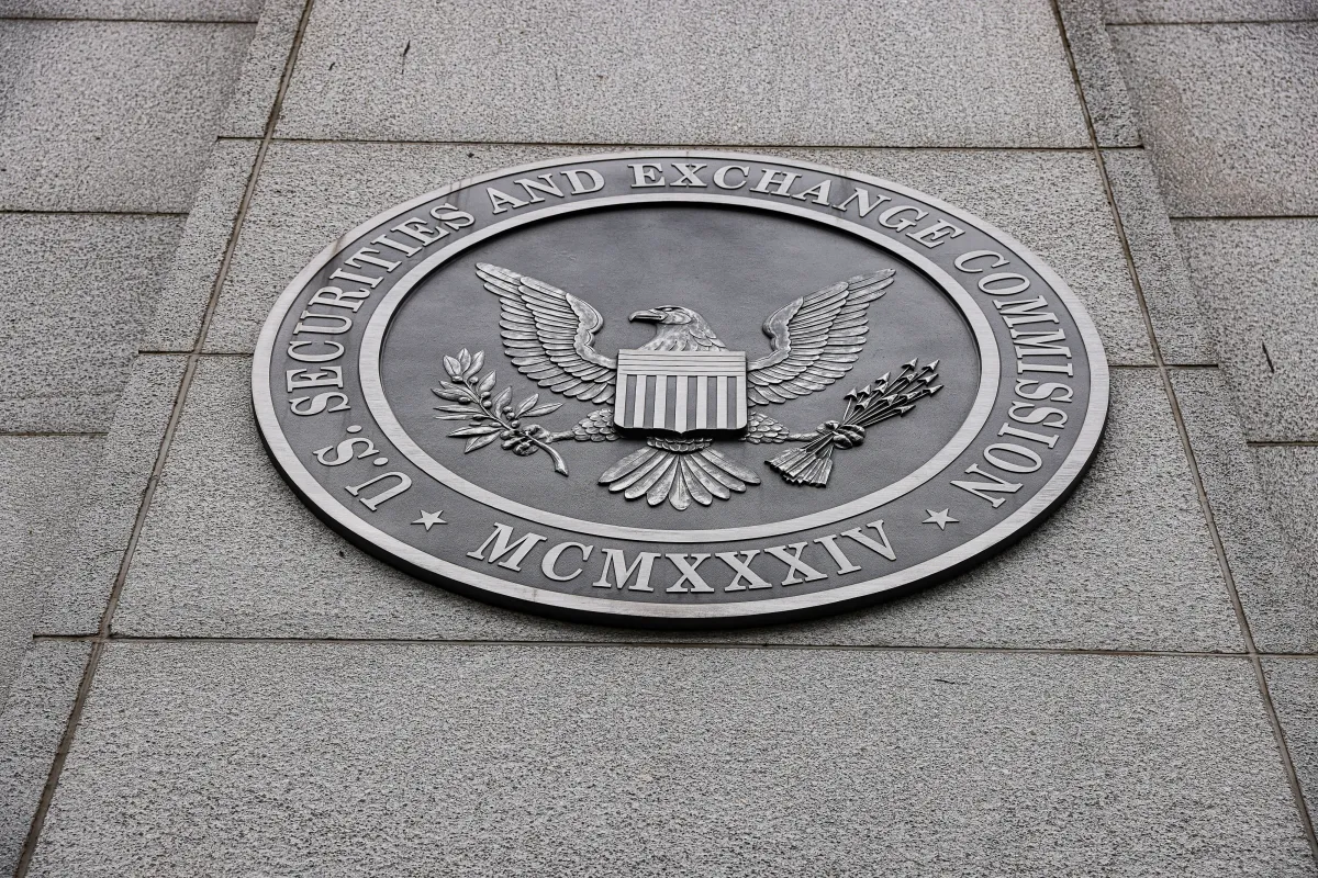U.S. Securities and Exchange Commission seal on a stone wall, featuring an eagle with shield and inscriptions.