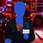 Silhouetted figure holds TV News microphone and clipboard, background of blurred emergency vehicles with red and blue lights.