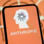 Anthropic logo on a smartphone screen with an abstract background, featuring a head silhouette with a starburst design.