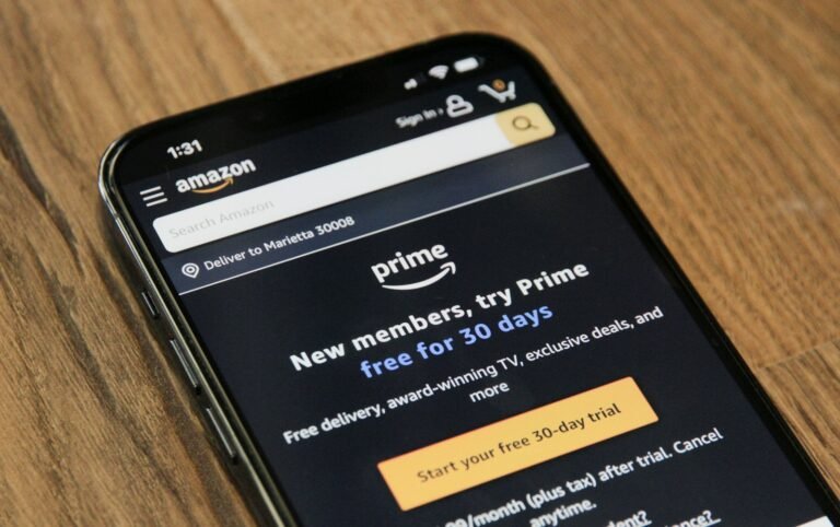 Amazon order emails on a phone screen with vague category labels and AI shopping context