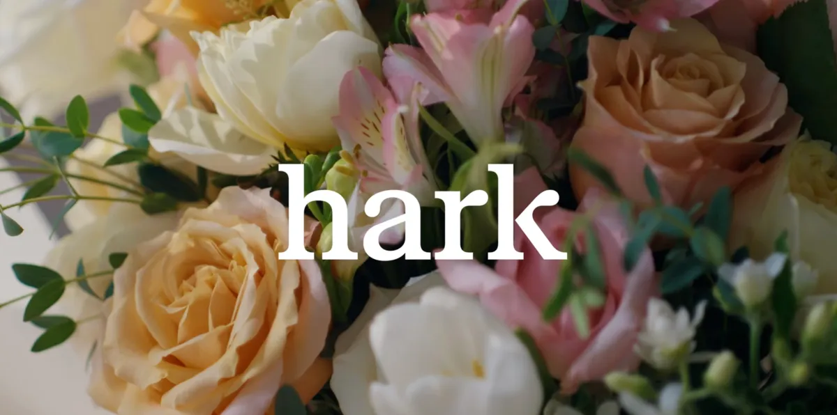 Assorted flowers with the word "hark" in white text overlaid.