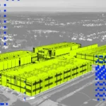 Aerial view of a large data center under construction, highlighted in yellow with blue pixelated elements overlaid.
