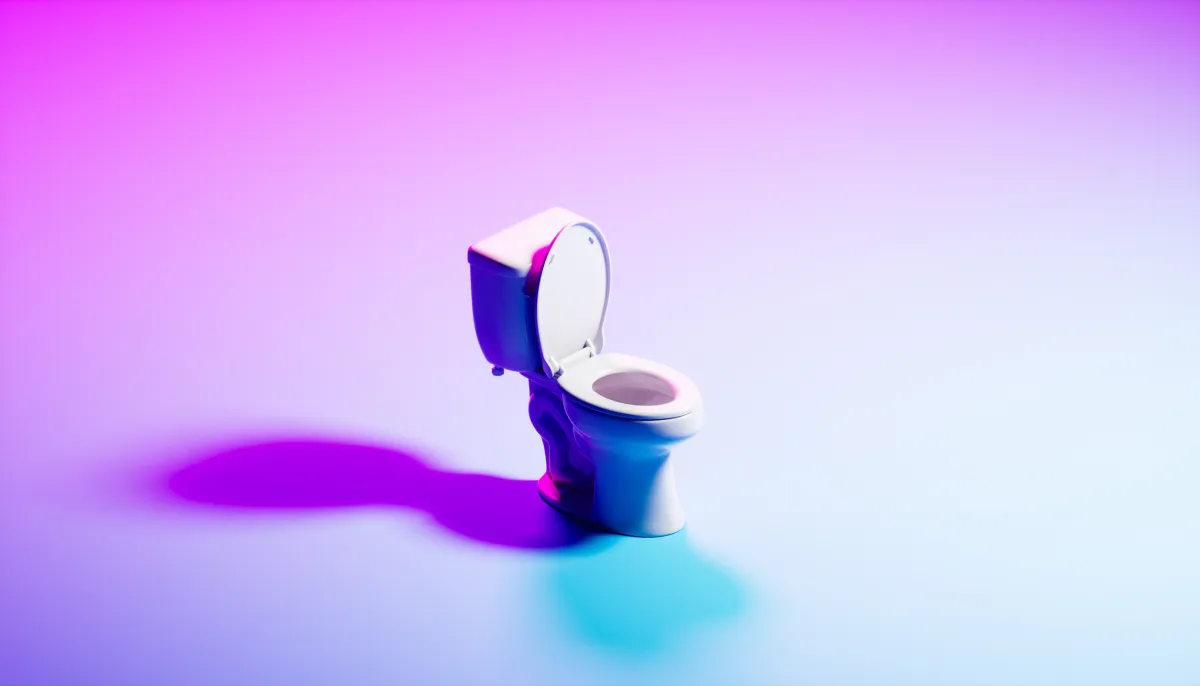 White toilet with open lid on a gradient background of pink and blue hues, casting a purple shadow.