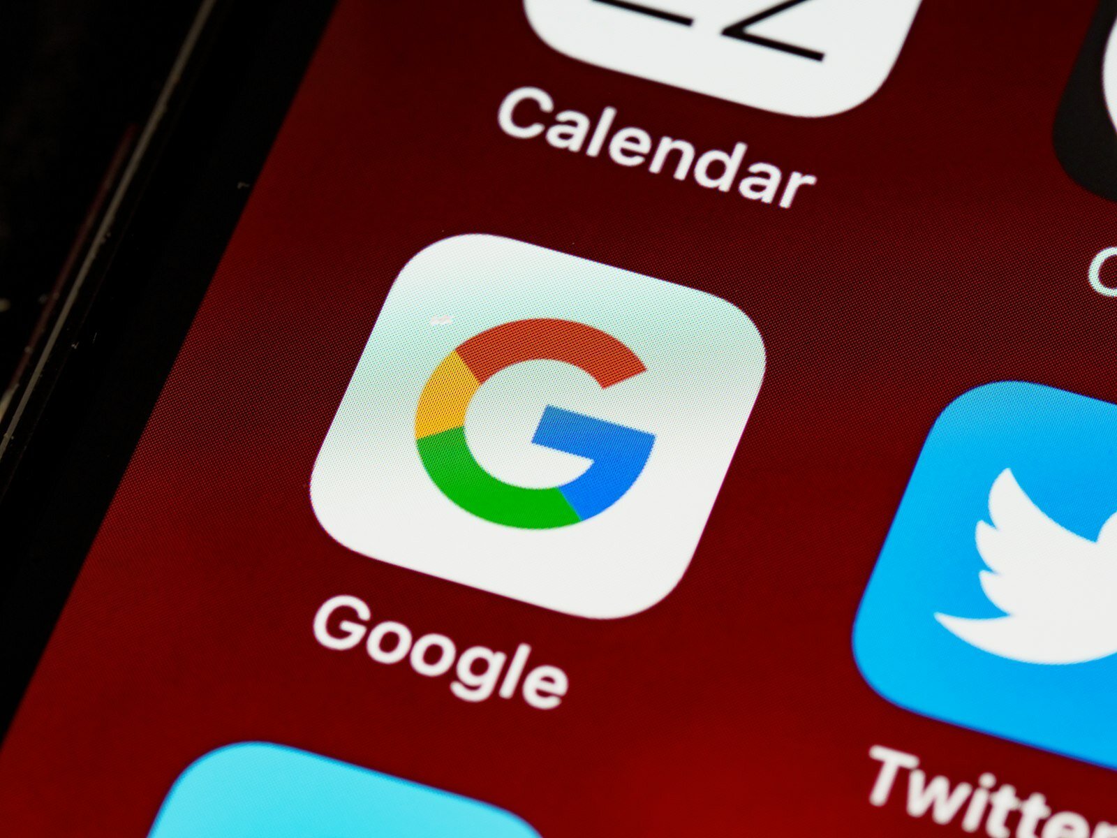 Gemini app milestone on a smartphone screen with Google branding and voice assistant interface