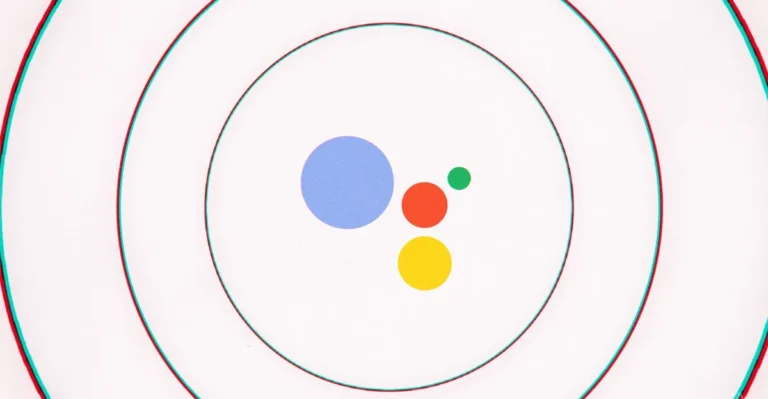 Four colored circles (blue, red, yellow, green) on a white background, encircled by three black concentric rings.