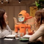 Humanoid robot from Unitree used as an influencer in a city street