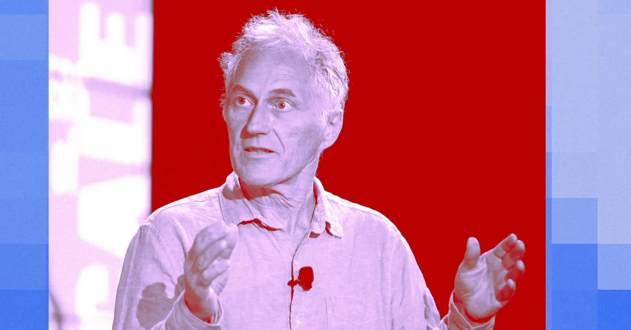 Man speaking with hands raised, wearing a light shirt and microphone, set against a red and blue background.