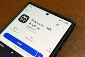 Smartphone screen displaying Perplexity AI app listing with install button, 4.1-star rating, and 19K reviews