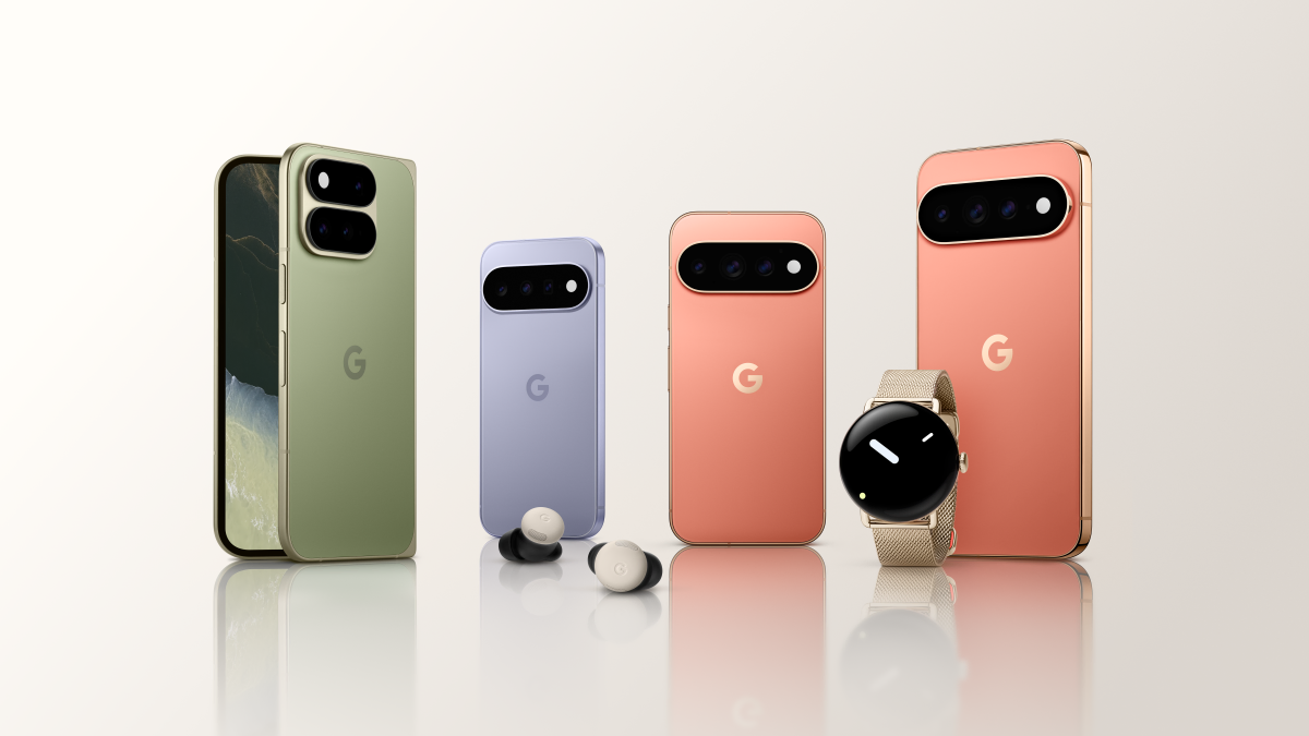 Four smartphones in various colors, earbuds, and a smartwatch with a beige band displayed on a reflective surface.