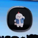 A cartoon character in a blue coat and red hat holding a lantern displayed on a screen against a blue background.