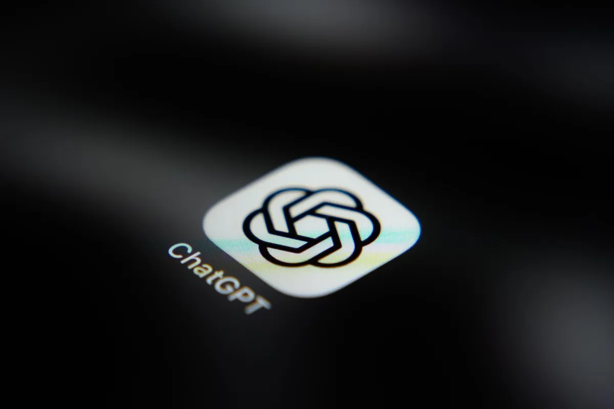 ChatGPT app icon on a dark screen, featuring a white logo and the text "ChatGPT" beneath it.
