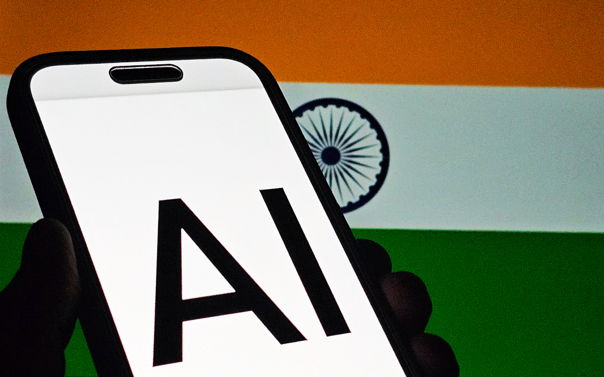 Smartphone screen displaying "AI" against the backdrop of the Indian flag