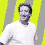 Person in a white t-shirt smiling against a background of alternating gray and neon yellow vertical stripes.