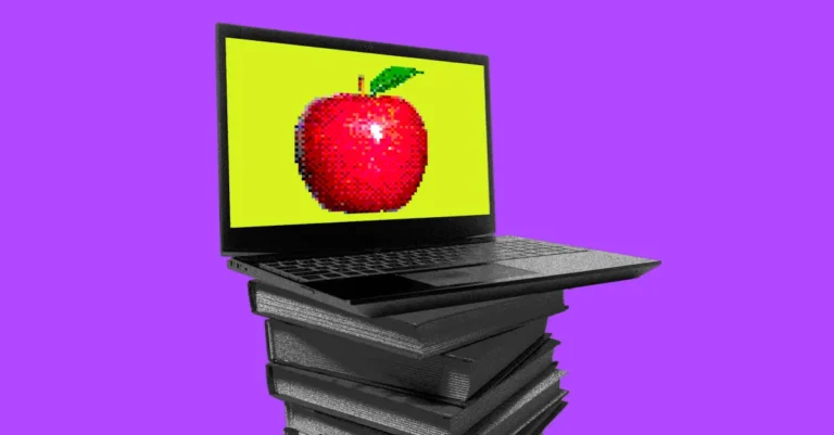 Laptop displaying pixelated apple on yellow screen sits on a stack of black books against a purple background