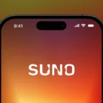 Smartphone screen displaying the word "Suno" with a gradient background and icons showing time, signal, and battery status.