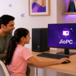 Man and girl using a desktop computer with JioPC logo on screen; purple-themed room with books and plant on shelves.