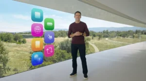 Man in a burgundy shirt stands in a modern building with large windows. Colorful app icons float beside him.
