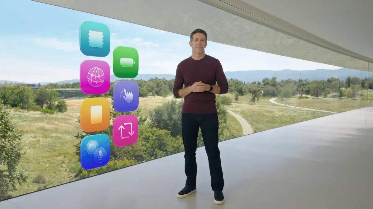 Man in a burgundy shirt stands in a modern building with large windows. Colorful app icons float beside him.