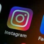 Meta One AI subscription plans on a smartphone screen with Facebook, Instagram and WhatsApp apps