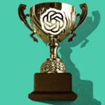 Golden trophy with a stylized logo on a teal background, casting a shadow to the right.