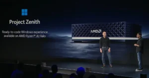 Two presenters on stage with "Project Zenith" text and an AMD server image in the background, audience in silhouette.