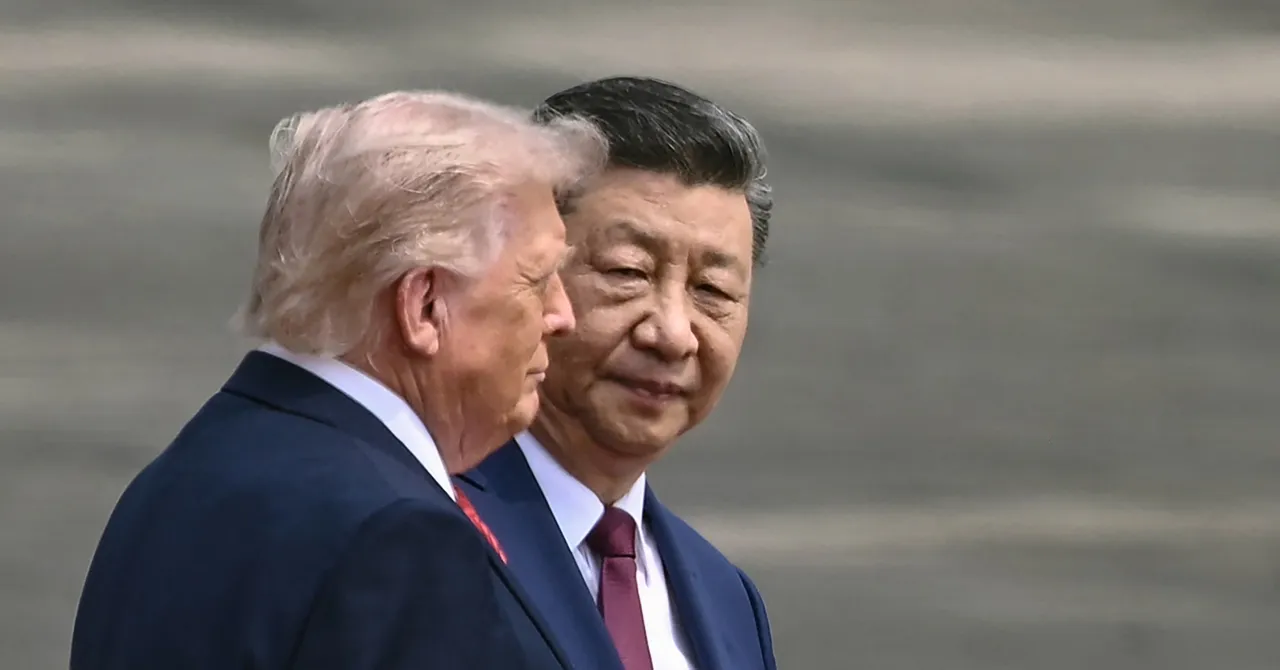 Two men in suits walking closely together, one with light hair and the other with dark hair, in an outdoor setting.