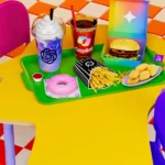 Colorful tray with fast food items on a yellow, puzzle-shaped table, pink and purple chairs, checkered floor.