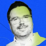 Smiling man with glasses on a blue and green abstract background, geometric shapes and lines in the design