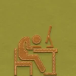 Brown felt figure slumped over a desk with a computer on an olive green background.