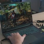 AI Playground interface on a laptop creating a browser game from a prompt