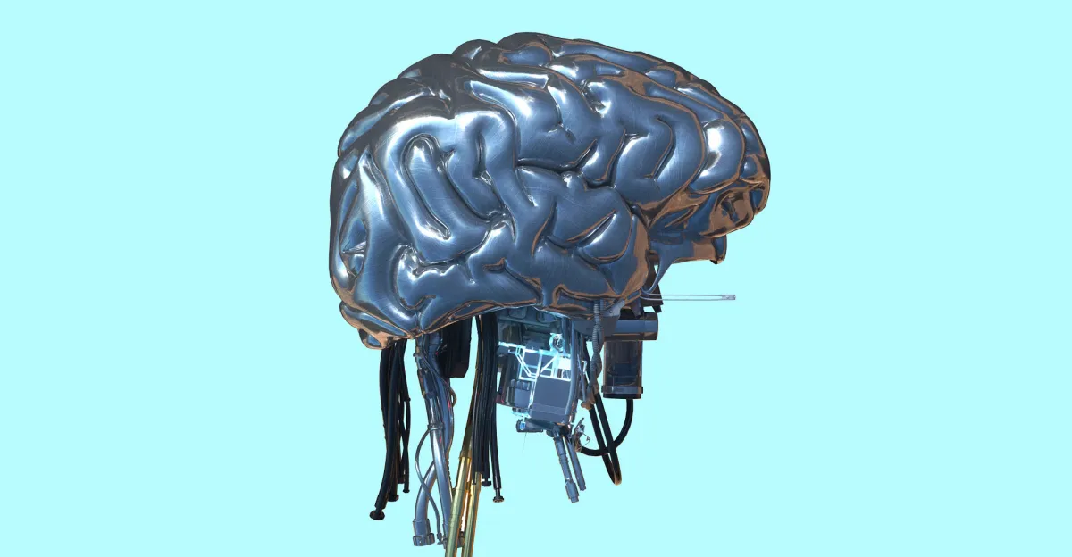 Metallic brain sculpture with cables and electronic components on a light blue background