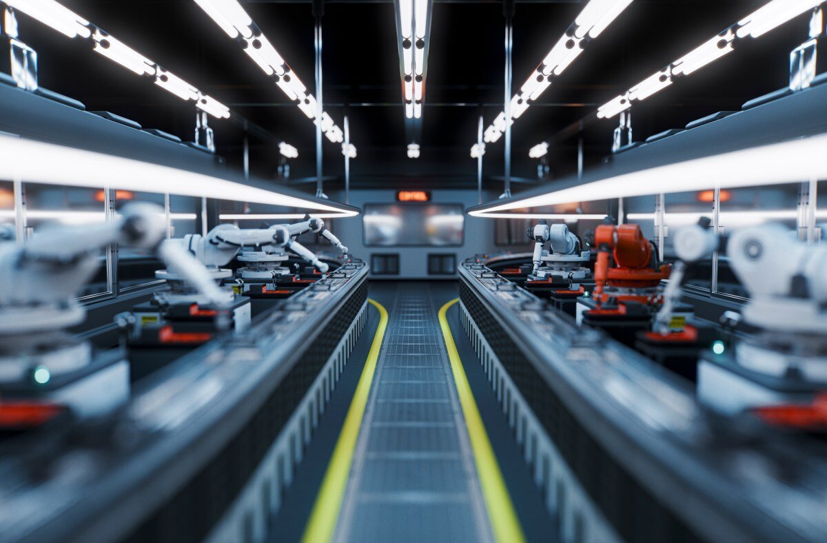 Robotic arms lined up in a futuristic factory setting under bright ceiling lights on a conveyor system