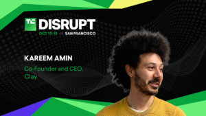 Man in yellow sweater with curly hair, text reads: Disrupt, Oct 13-15, San Francisco, Kareem Amin, Co-Founder and CEO, Cla...