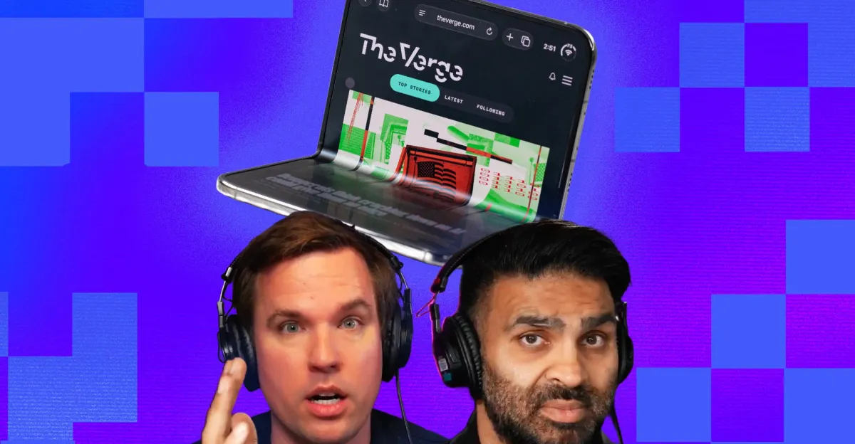 Two people wearing headphones with a foldable device displaying The Verge website on a blue checkered background.